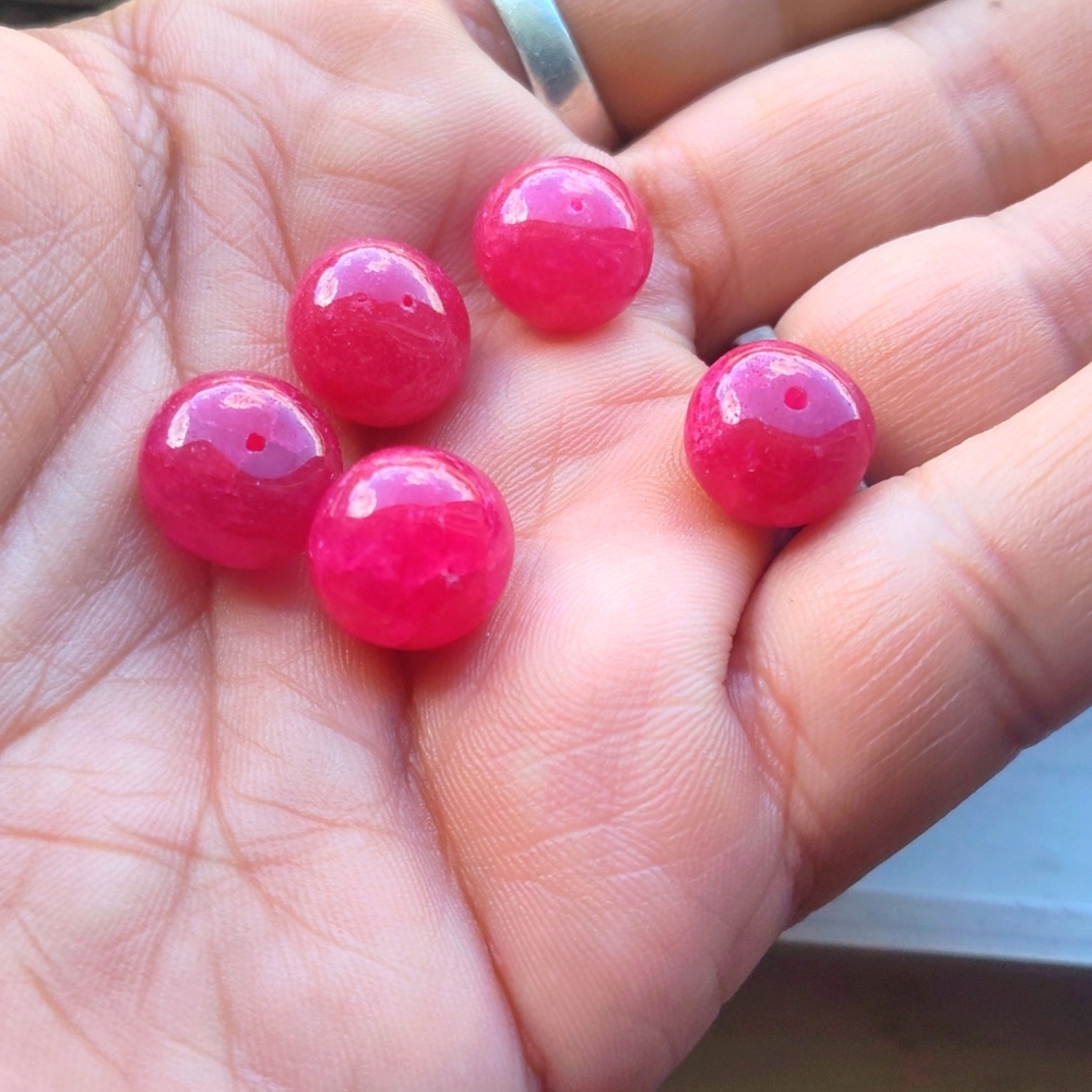Genuine diamond drilled ruby beads.per bead